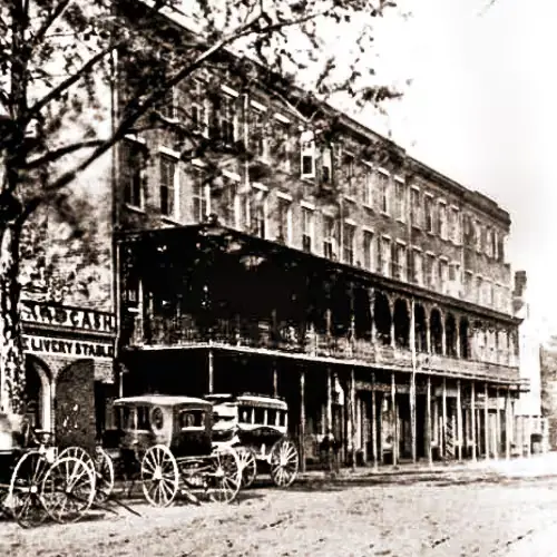 a weathered vintage photo of the Marshall House from about 1875 in Savannah Georgia
