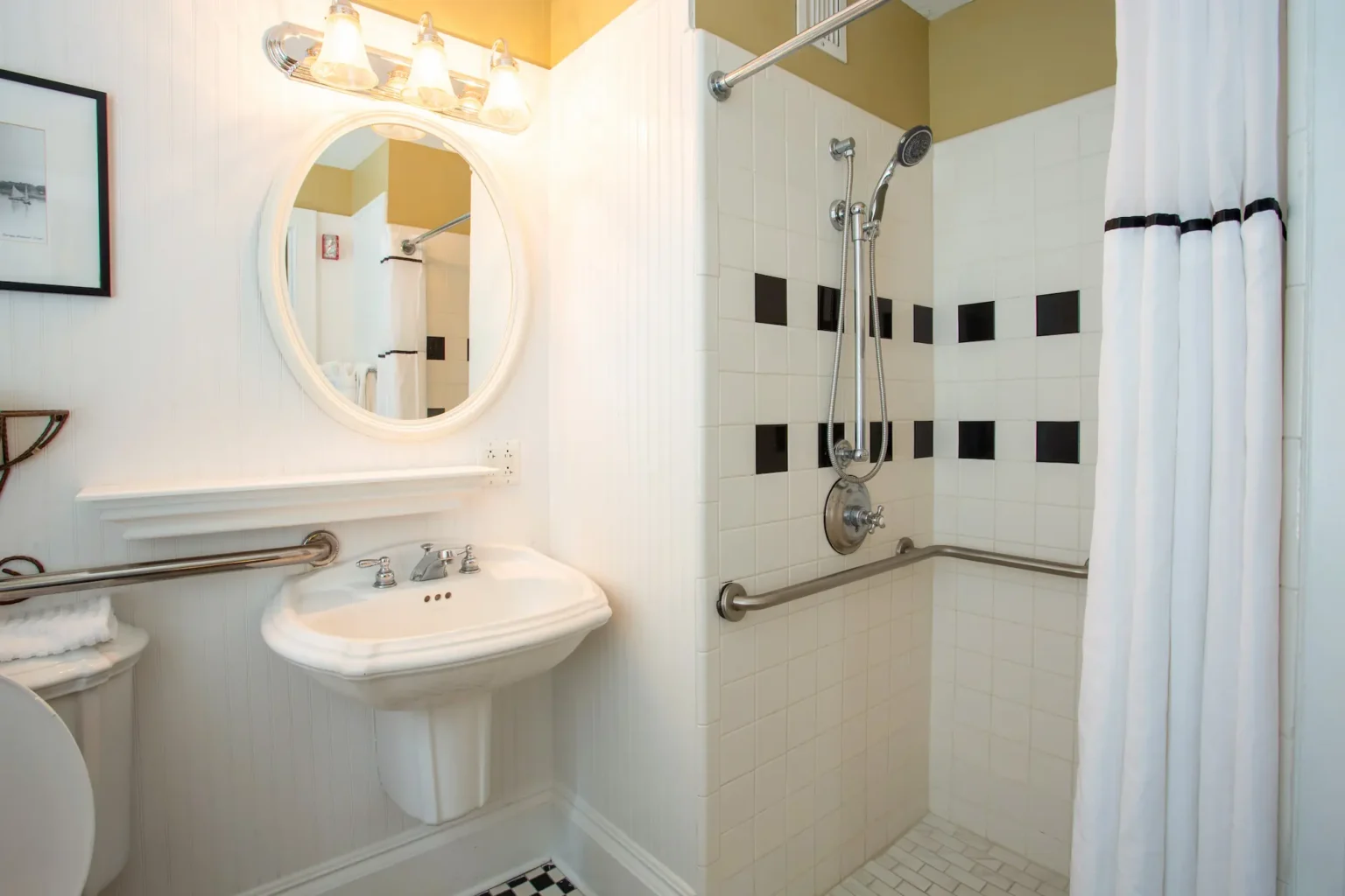 a roll-in shower in an accessible king room at the Marshall House hotel