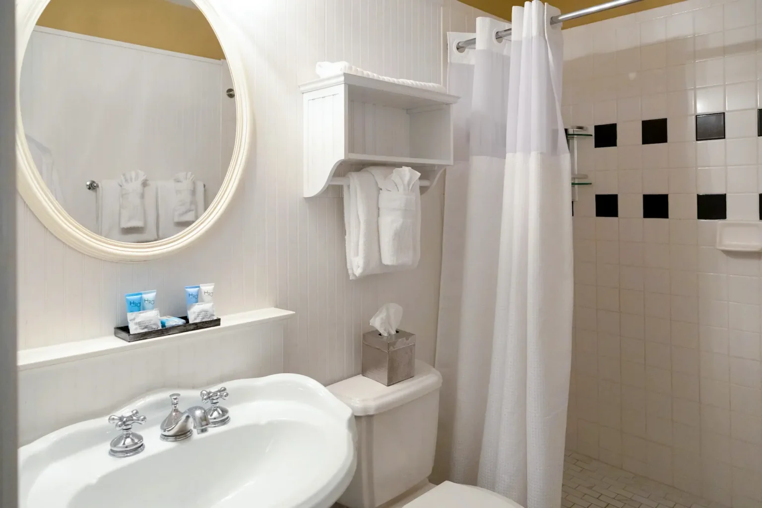 the bathroom of a Balcony King room at the Marshall House hotel