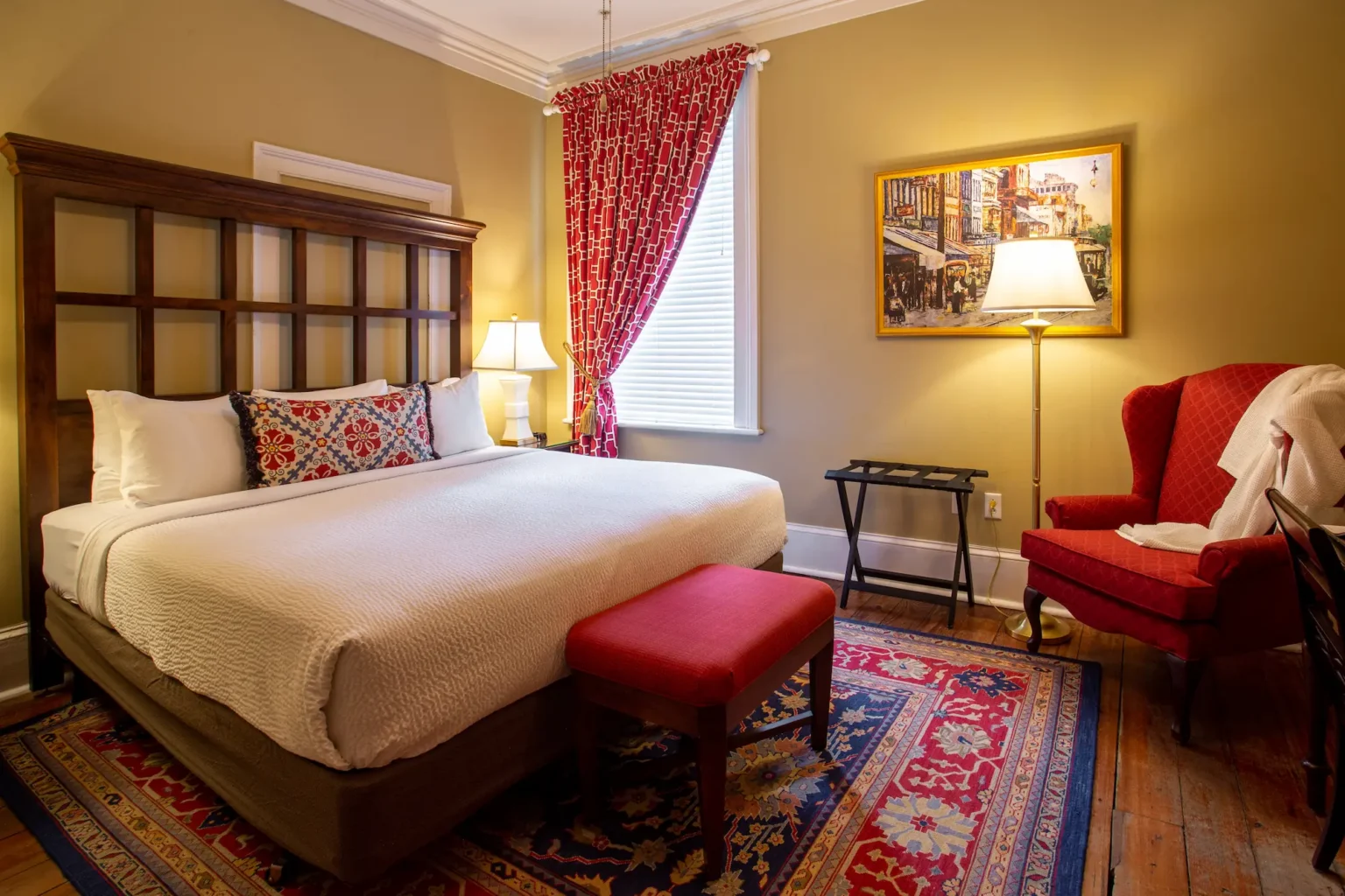 bed and chair in the classic king room at the Marshall House hotel