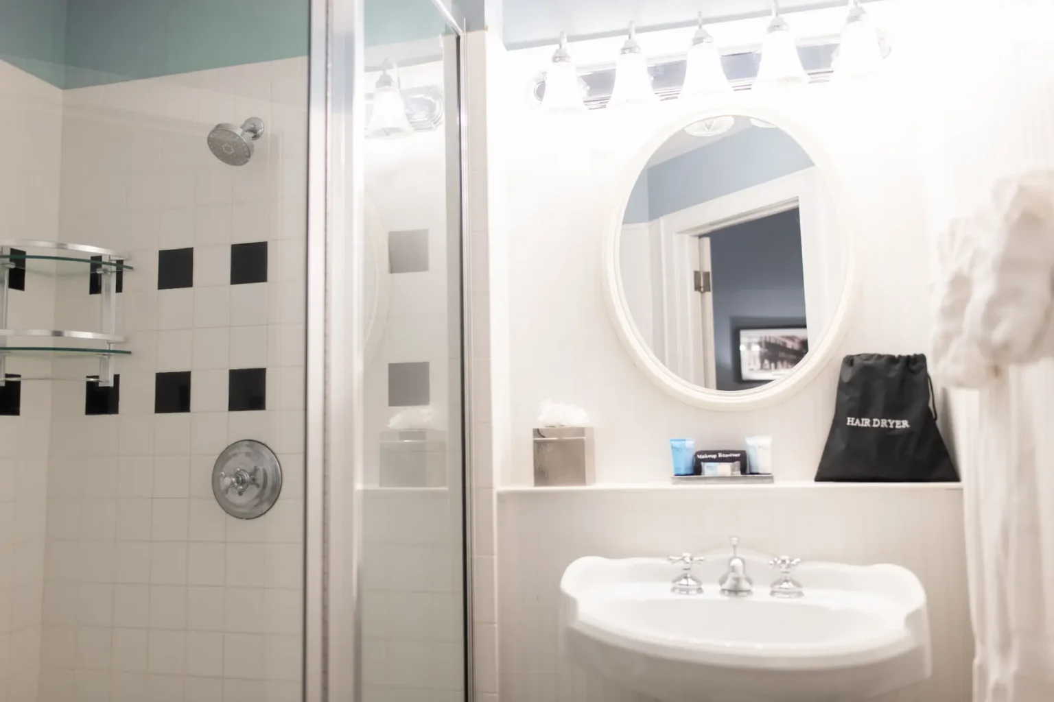 vanity and sink in the double queen room at the Marshall House hotel