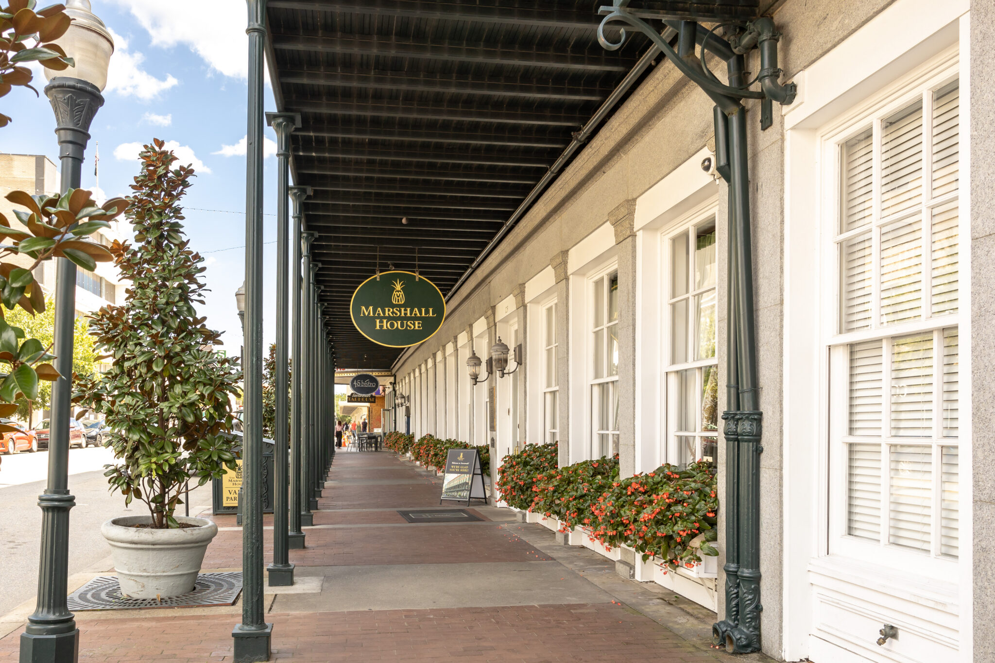 the walkway under the veranda at the Marshall House in Savannah, Georgia