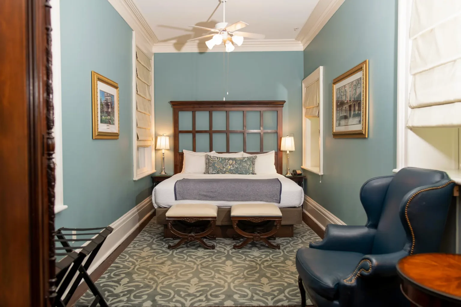 the bedroom in the luxury king suite at the Marshall House hotel