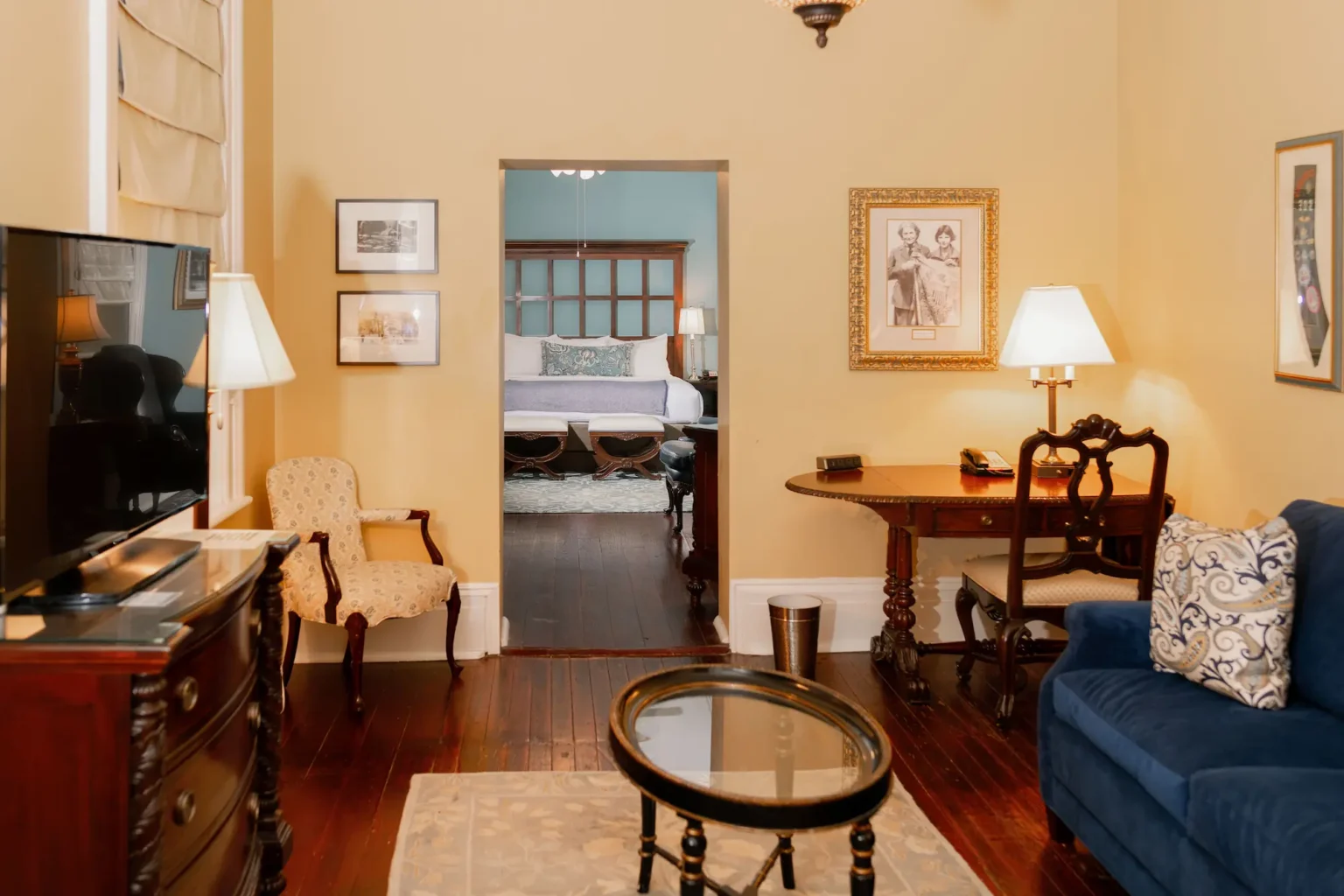 a view through the lounge back to the bedroom of the luxury king suite at the Marshall House hotel
