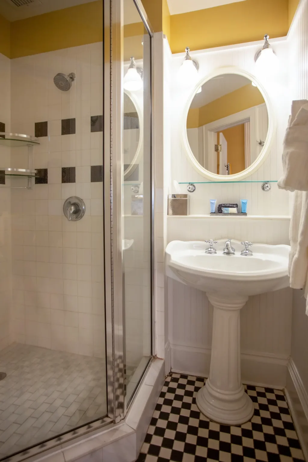the vanity and sink in the luxury king suite at the Marshall House hotel