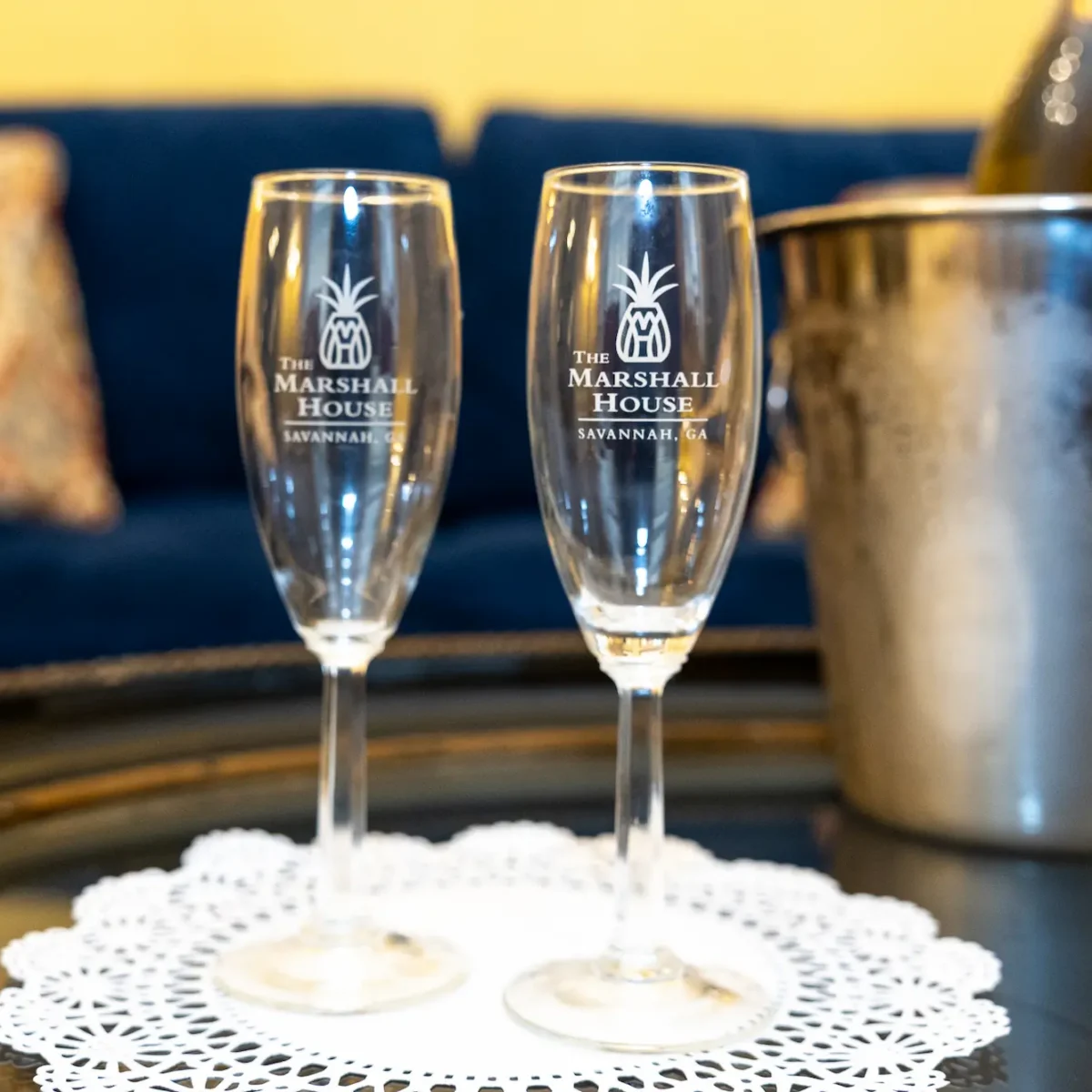 Champagne glasses with Marshall House branding