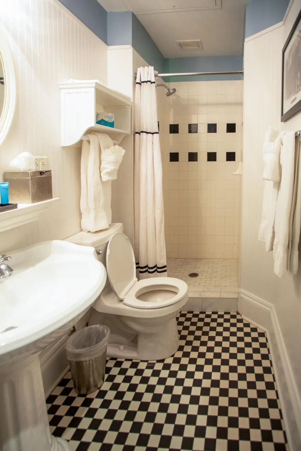 the bathroom of a petite queen room at the Marshall House hotel