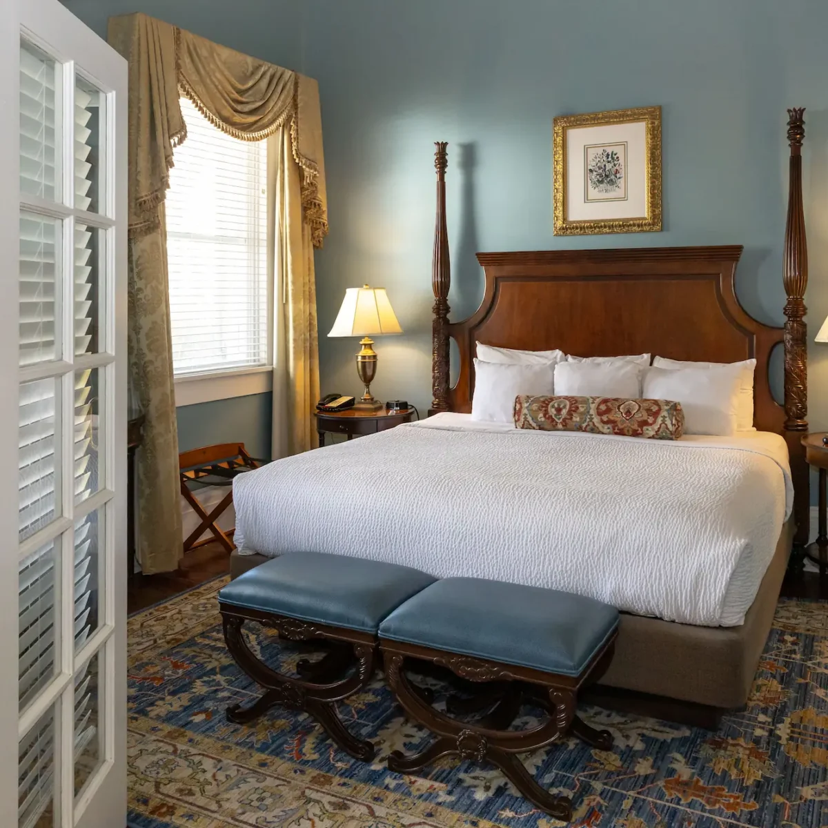 the beautiful antique bed in the famous Mary Marshall Suite at the Marshall House hotel