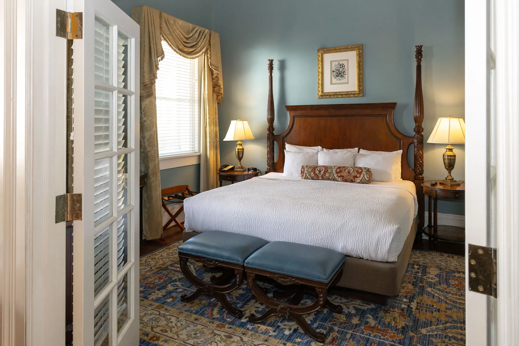 the beautiful antique bed in the famous Mary Marshall Suite at the Marshall House hotel